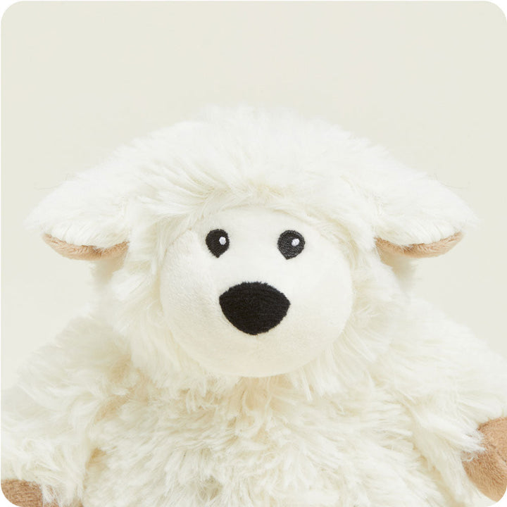 Warmies Junior plush sheep toy in cream white with black embroidered face