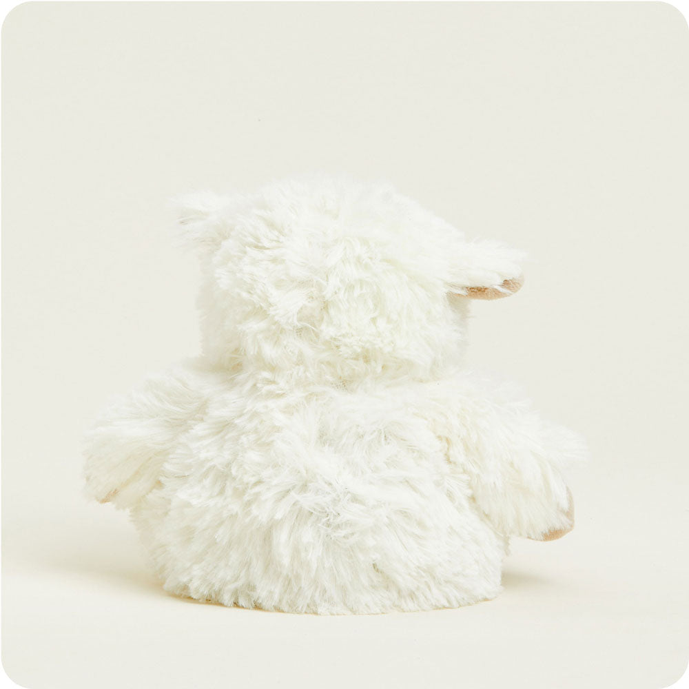 Warmies Junior sheep-shaped plush toy in cream white fluffy texture