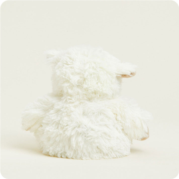 Warmies Junior sheep-shaped plush toy in cream white fluffy texture