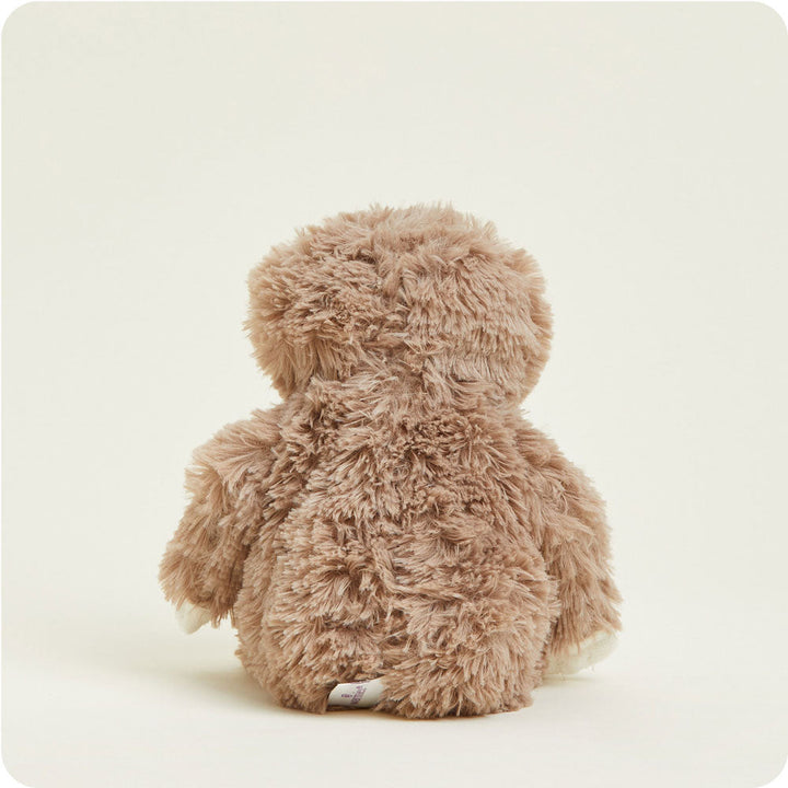 Brown fuzzy Junior Warmies sloth plush toy shown from back on white background