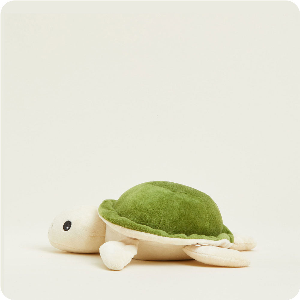 Warmies Junior turtle plush toy in green and cream colors on white background