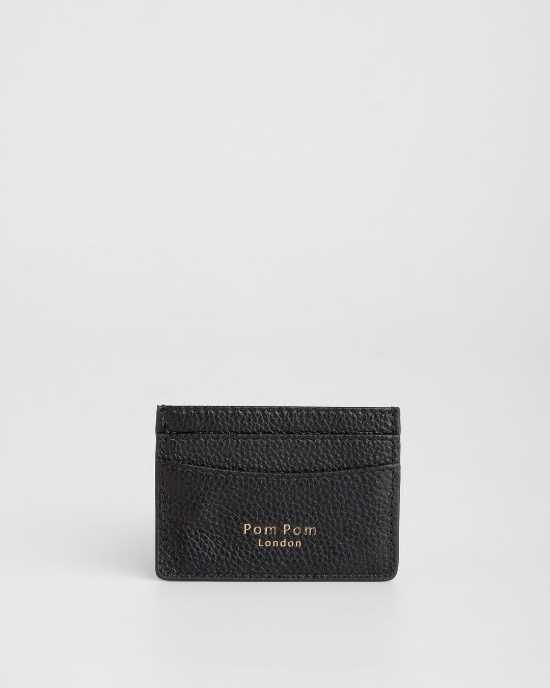 Black leather card holder with textured finish and Pom Pom London branding