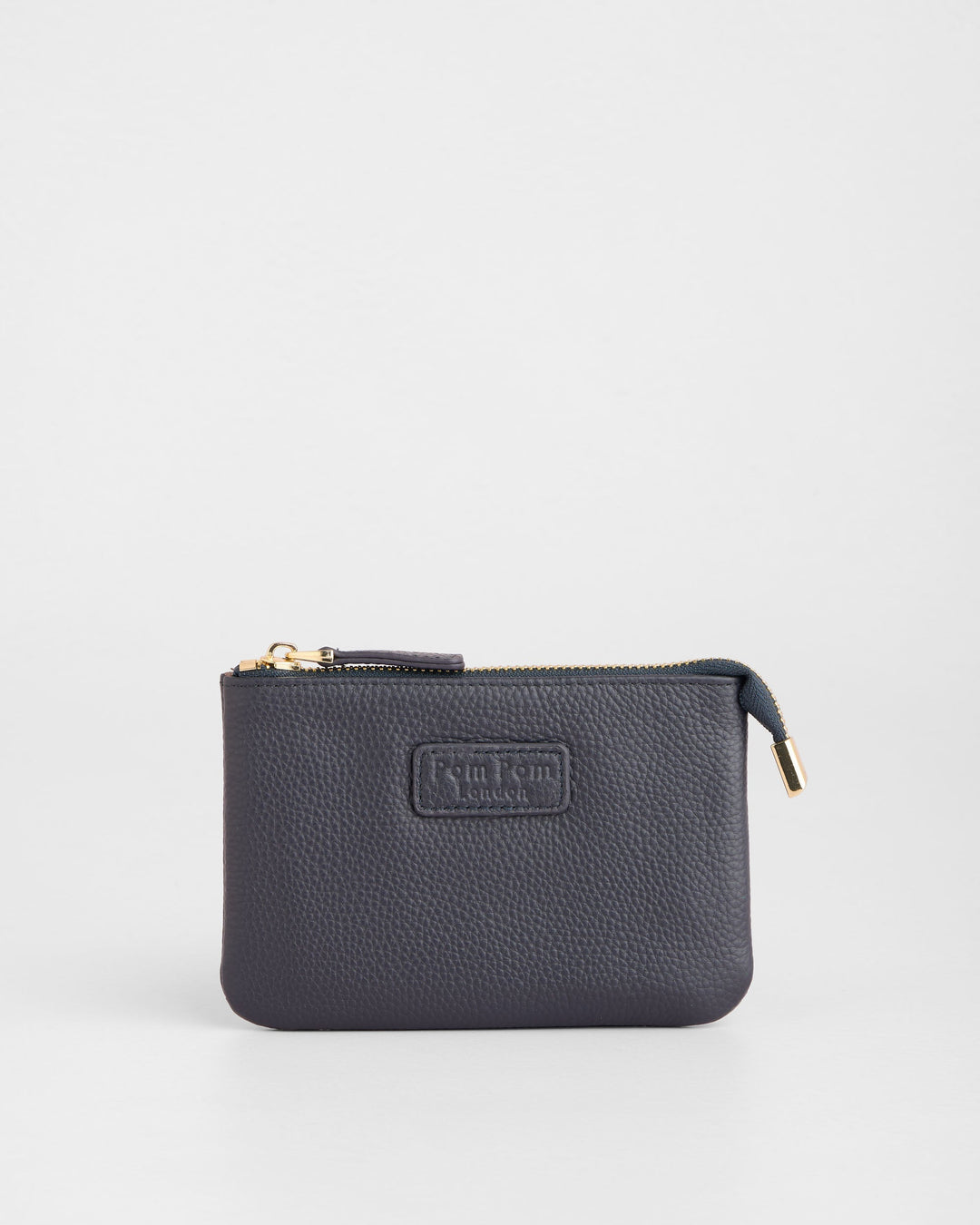 Navy blue leather coin purse with zip closure and Pom Pom London branding