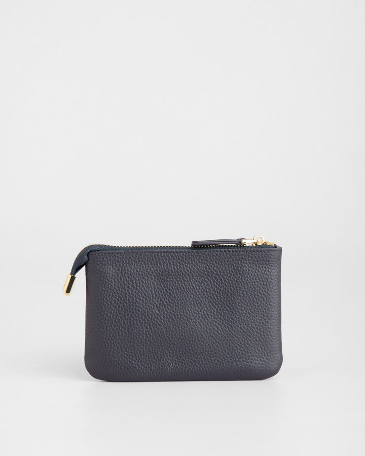 Navy blue leather coin purse with zipper closure and gold hardware