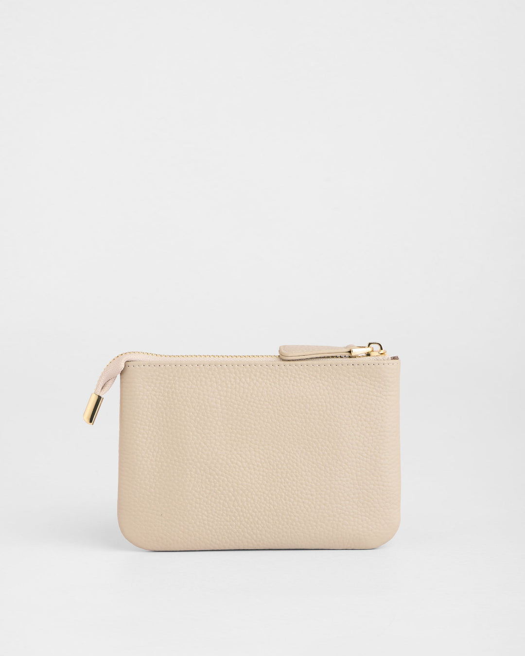 Stone beige leather coin purse with gold zipper and pull tab on white background
