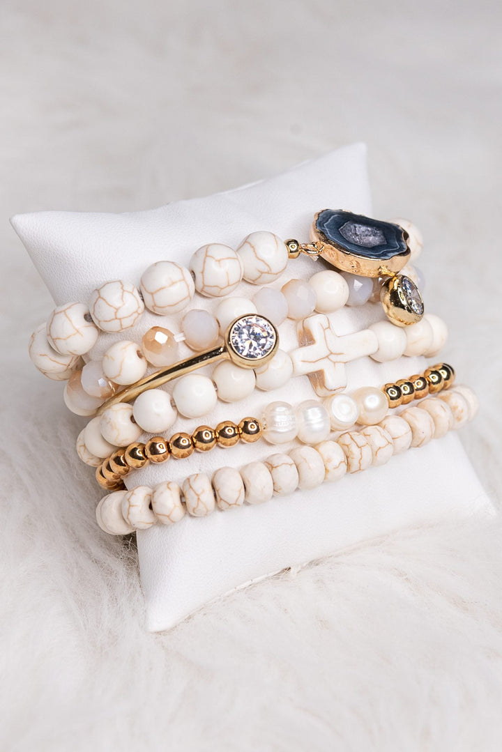 Aspen white and gold beaded bracelet set with druzy stone and crystal charms