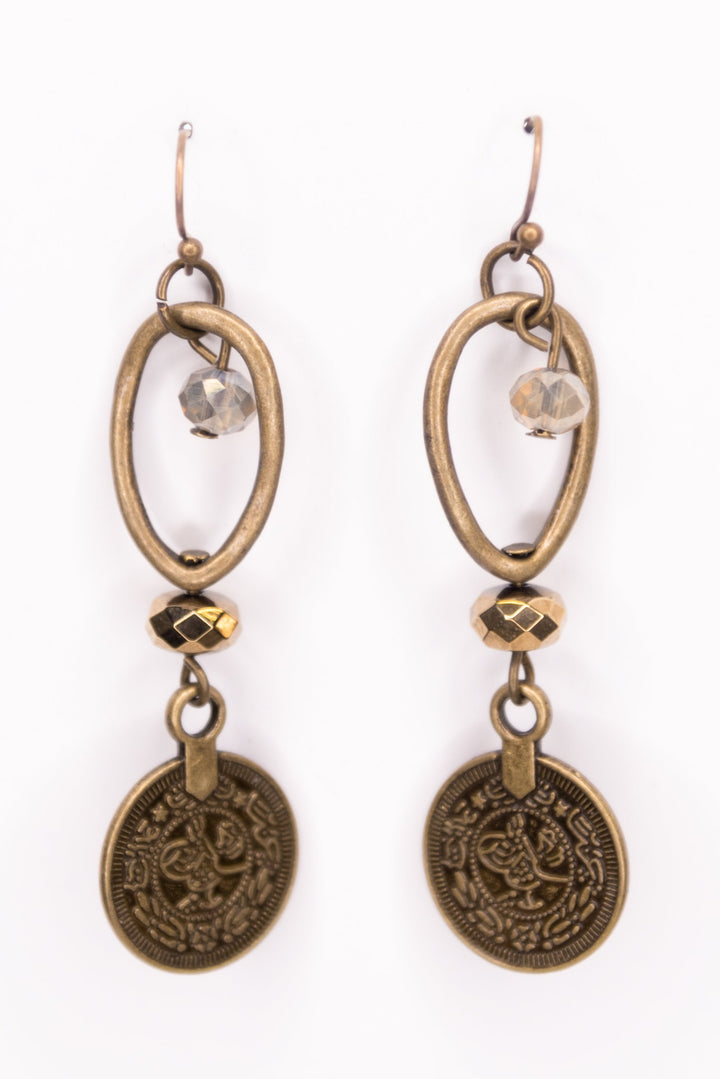 Brass dangle earrings with oval hoops, crystal beads, and engraved coin pendants