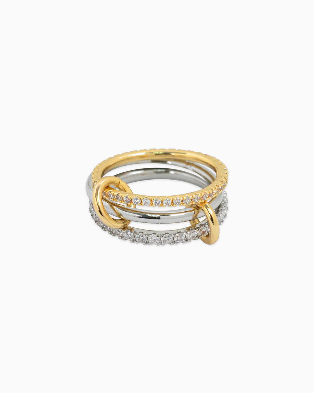 Sessori Interlocking Ring Stack featuring gold and silver bands with pavé crystal detailing