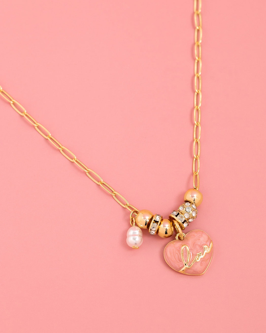 Gold chain necklace with blush marble love heart charm, pearl, and crystal beads