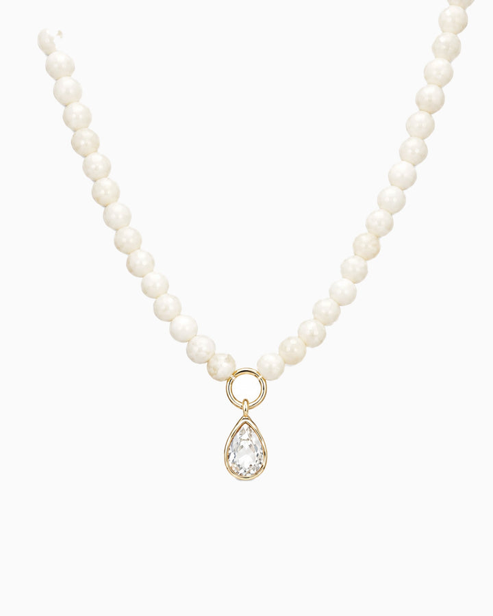 Sessori ivory pearl bead necklace with gold ring connector and clear teardrop crystal pendant