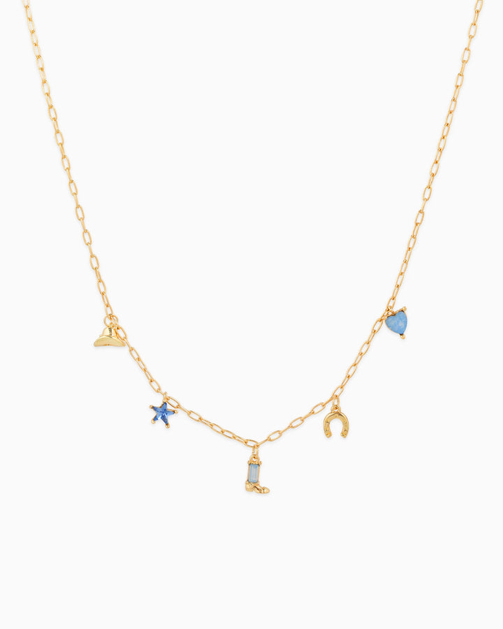 Gold chain western necklace with pastel blue cowboy boot, star, horseshoe, hat, and heart charms