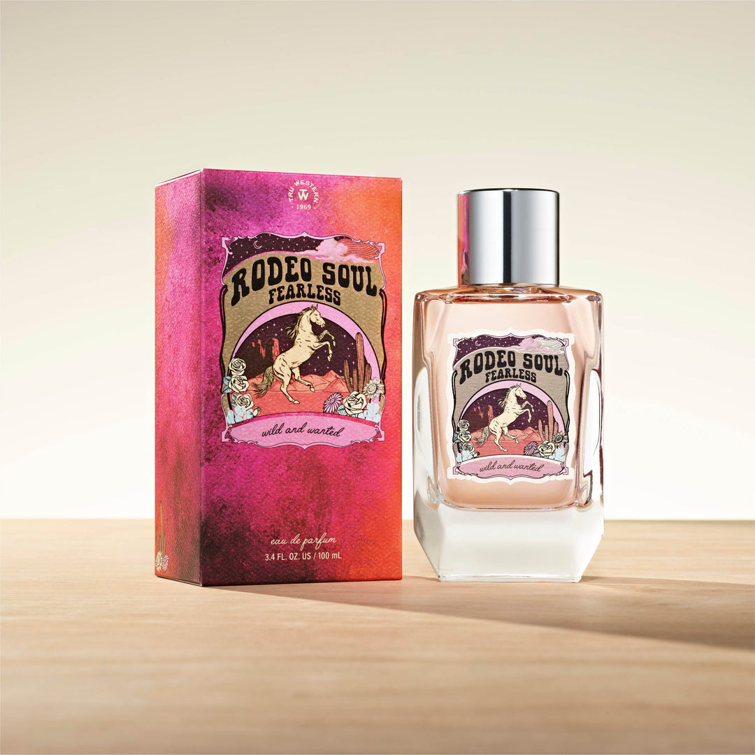 Rodeo Soul Fearless perfume bottle with pink-orange gradient box featuring horse design