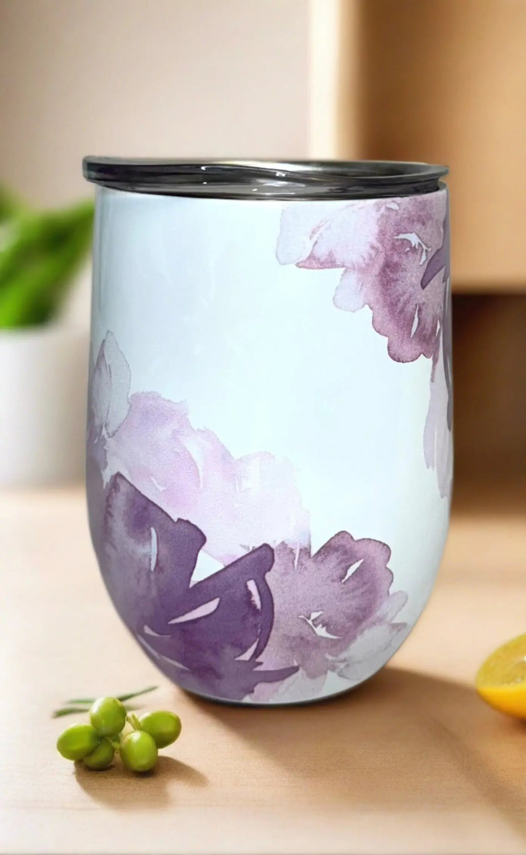 12 oz wine tumbler with purple watercolor floral design on white background
