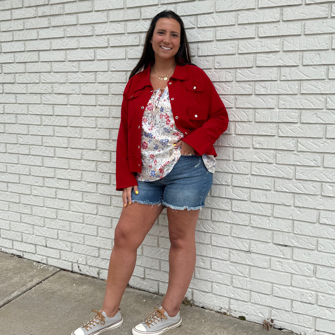 Cropped linen jean-style jacket with raw hem—fun, true-to-size layer for effortlessly stylish women 30+.









