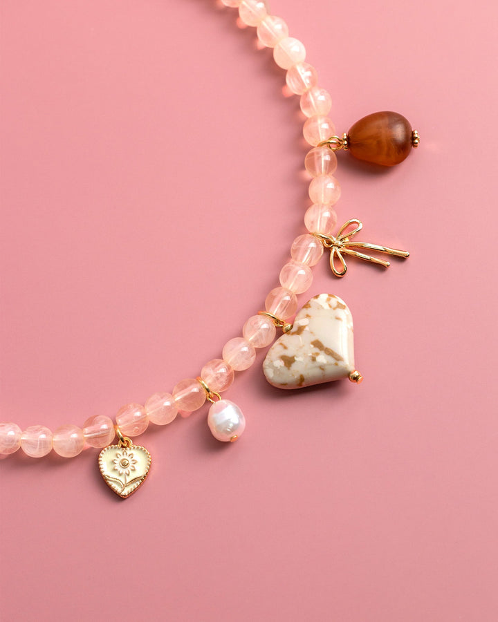 Ivory jade marbled heart charm necklace with pink rose quartz beads and gold accents