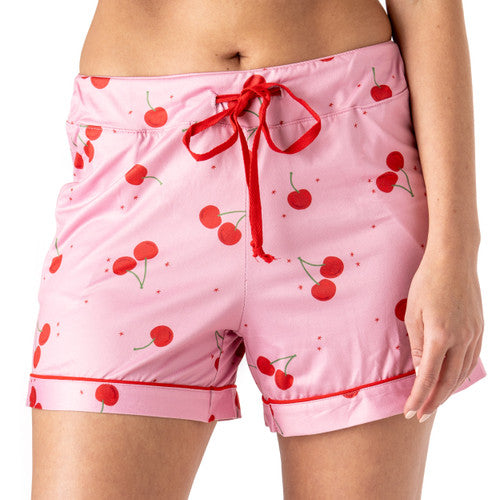 Pink pajama shorts with red cherry print and drawstring waist