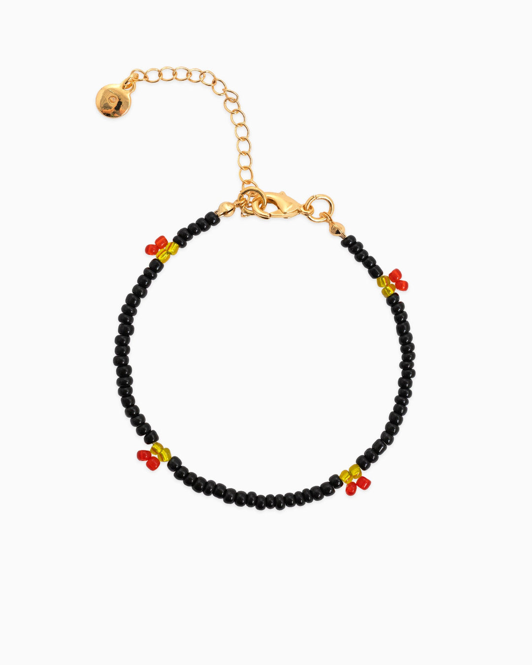 Sessori beaded bracelet with black beads, red cherry and yellow accent charms, gold lobster clasp