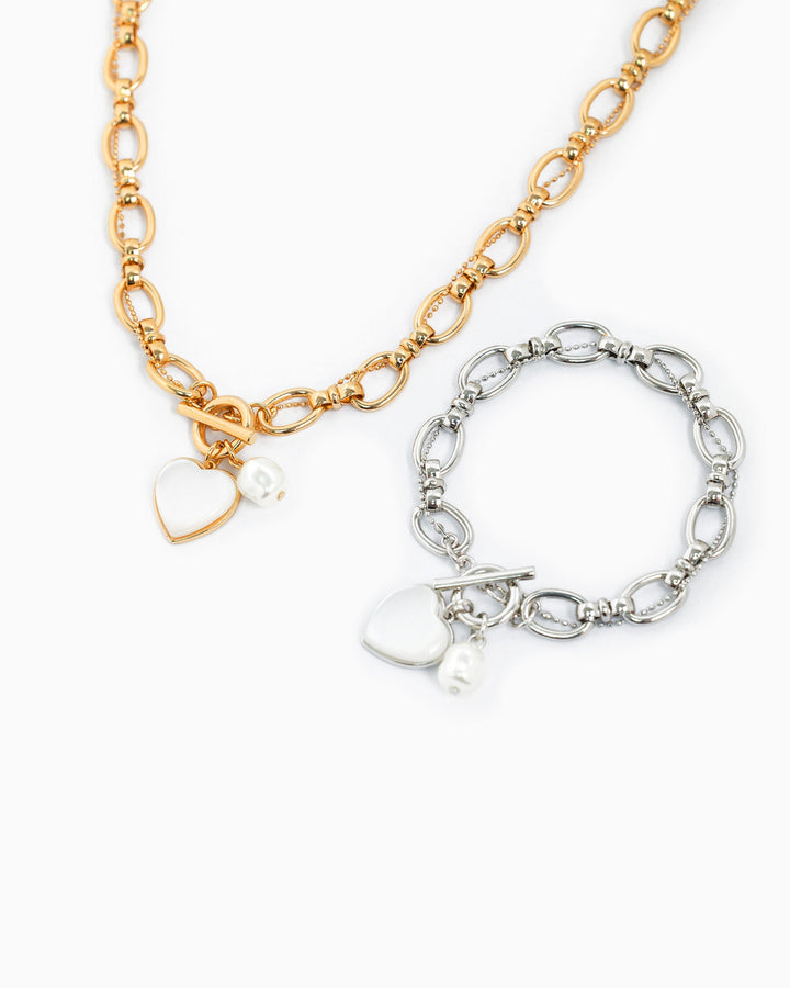 Sessori Glossy Heart Toggle Necklace in gold with white heart charm and pearl accent