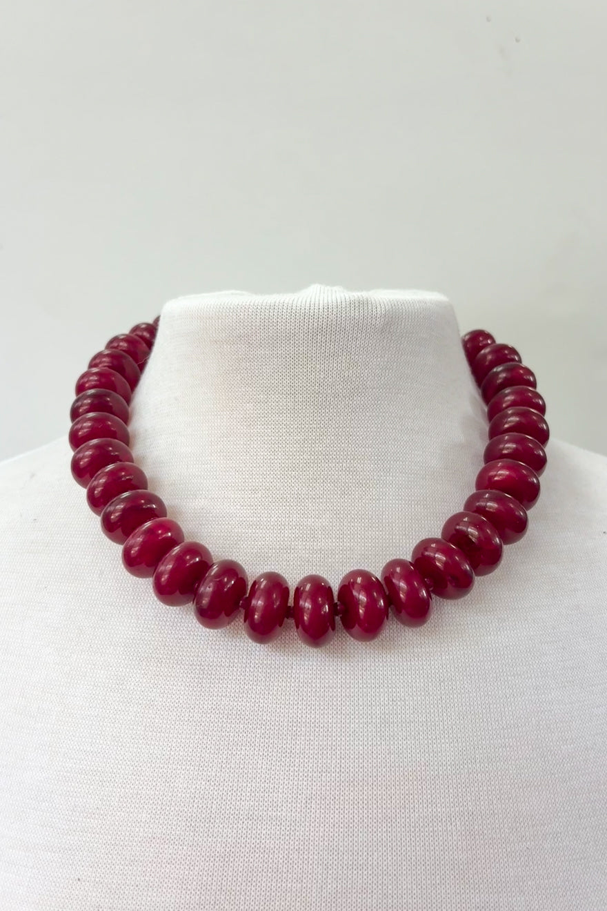 Dylan Jewelry Hallie Necklace with deep red rondelle beads on white mannequin