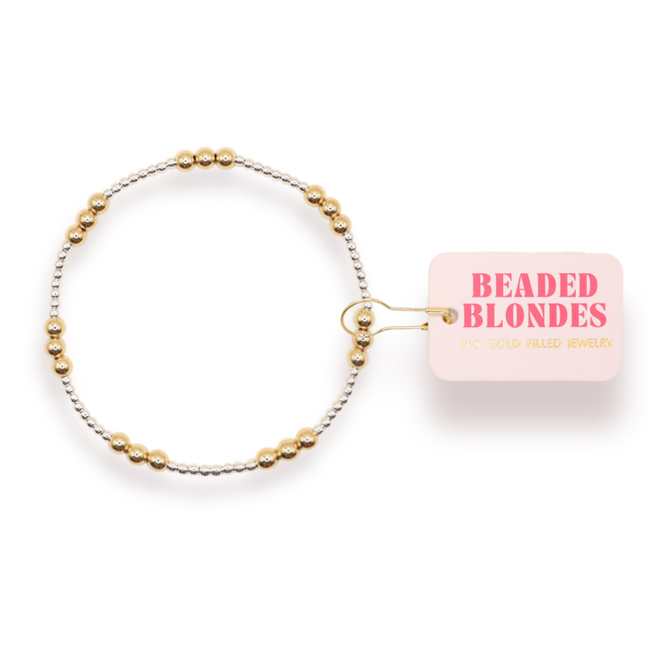 Beaded Blondes dainty stretch bracelet set combining gold and silver beads with brand tag