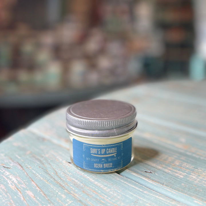Surf's Up Candle Ocean Breeze soy candle in small glass mason jar with silver lid