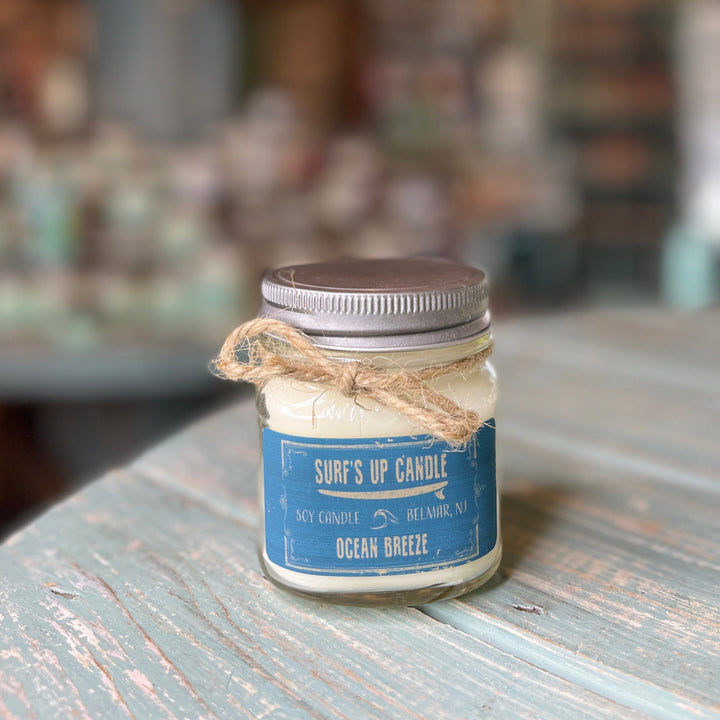 Surf's Up Candle Ocean Breeze soy candle in a mason jar with silver lid and twine bow