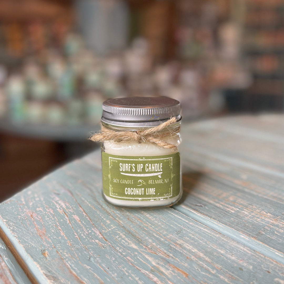 Surf's Up Candle Coconut Lime soy candle in small mason jar with metal lid and twine bow