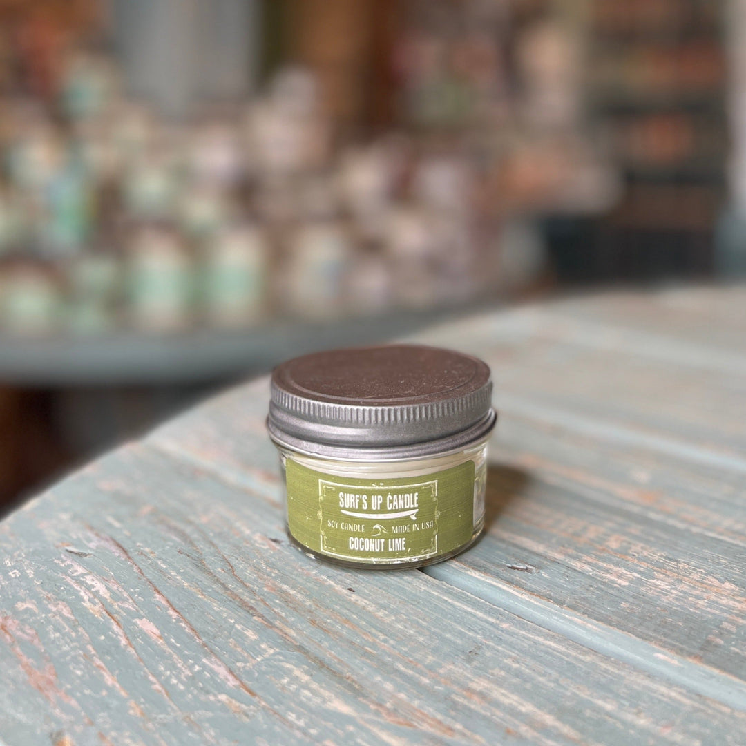 Surf's Up Candle Coconut Lime soy candle in small clear mason jar with silver lid