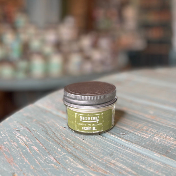 Surf's Up Candle Coconut Lime soy candle in small clear mason jar with silver lid