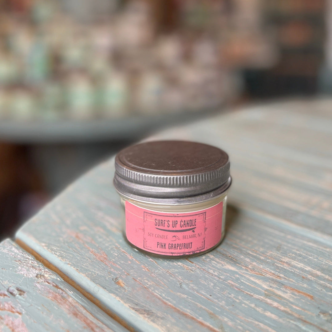 Surf's Up Candle Pink Grapefruit soy candle in small glass mason jar with metal lid