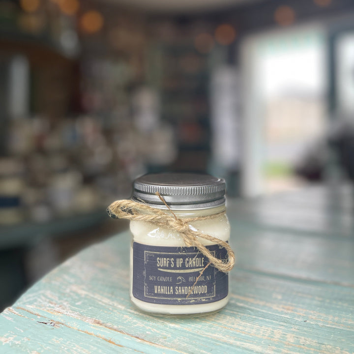 Surf's Up Candle Vanilla Sandalwood soy candle in small mason jar with twine bow
