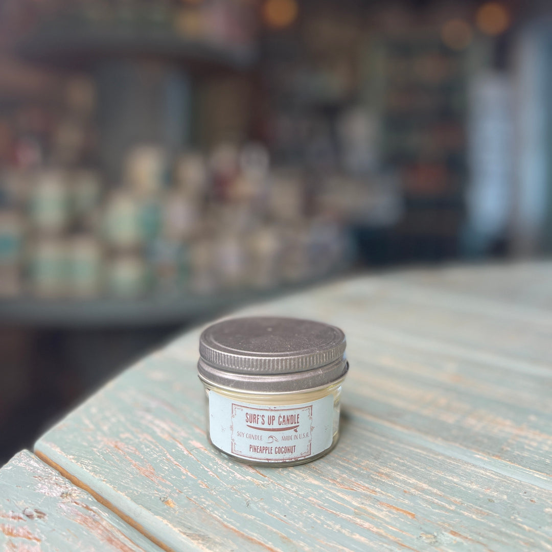 Surf's Up Candle Pineapple Coconut soy candle in small glass mason jar with silver lid