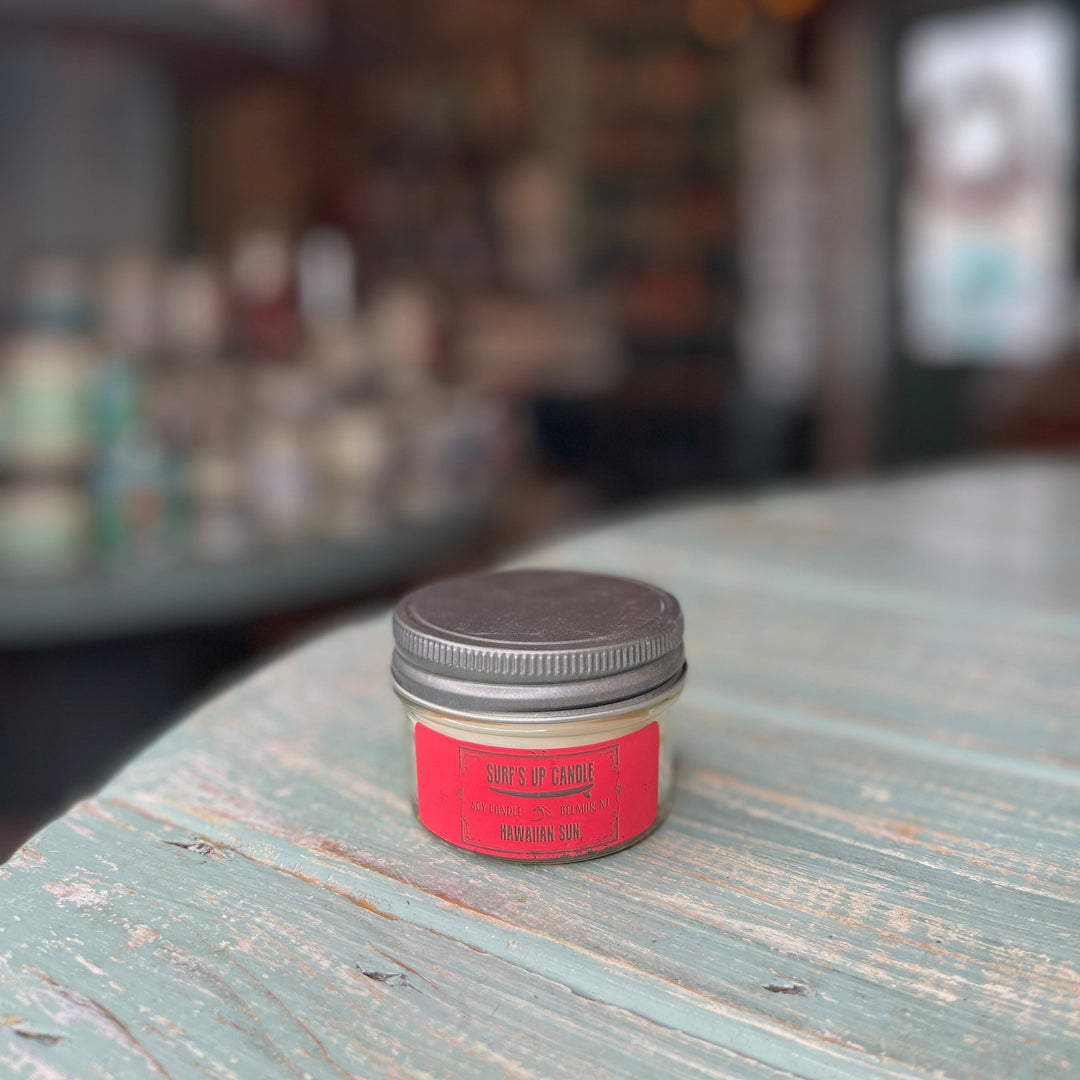 Surf's Up Candle Hawaiian Sun soy candle in small mason jar with red label and silver lid