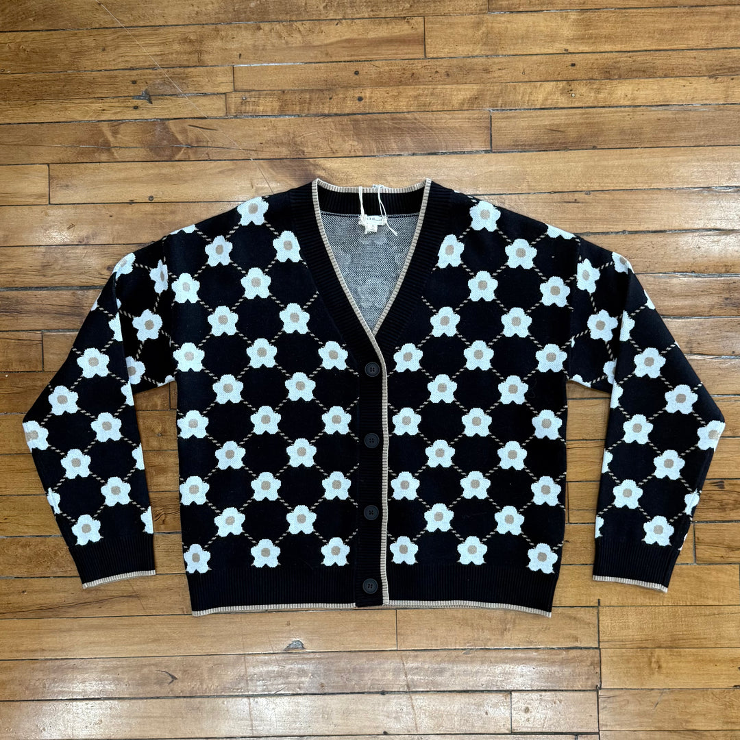 "Women’s button-front long sleeve top – features floral design and true-to-size fit for a stylish, feminine look."

