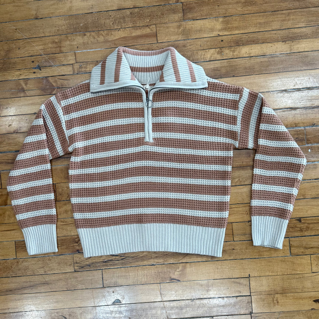 "Women’s half-zip top – features intricate crochet design and true-to-size fit for a stylish and breathable layering piece."

