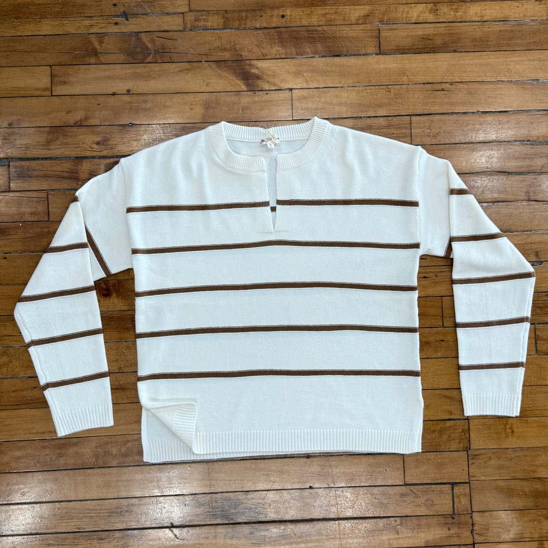 "Women’s V-neck top – super soft fabric with a true-to-size fit, offering a flattering and comfortable everyday style."

