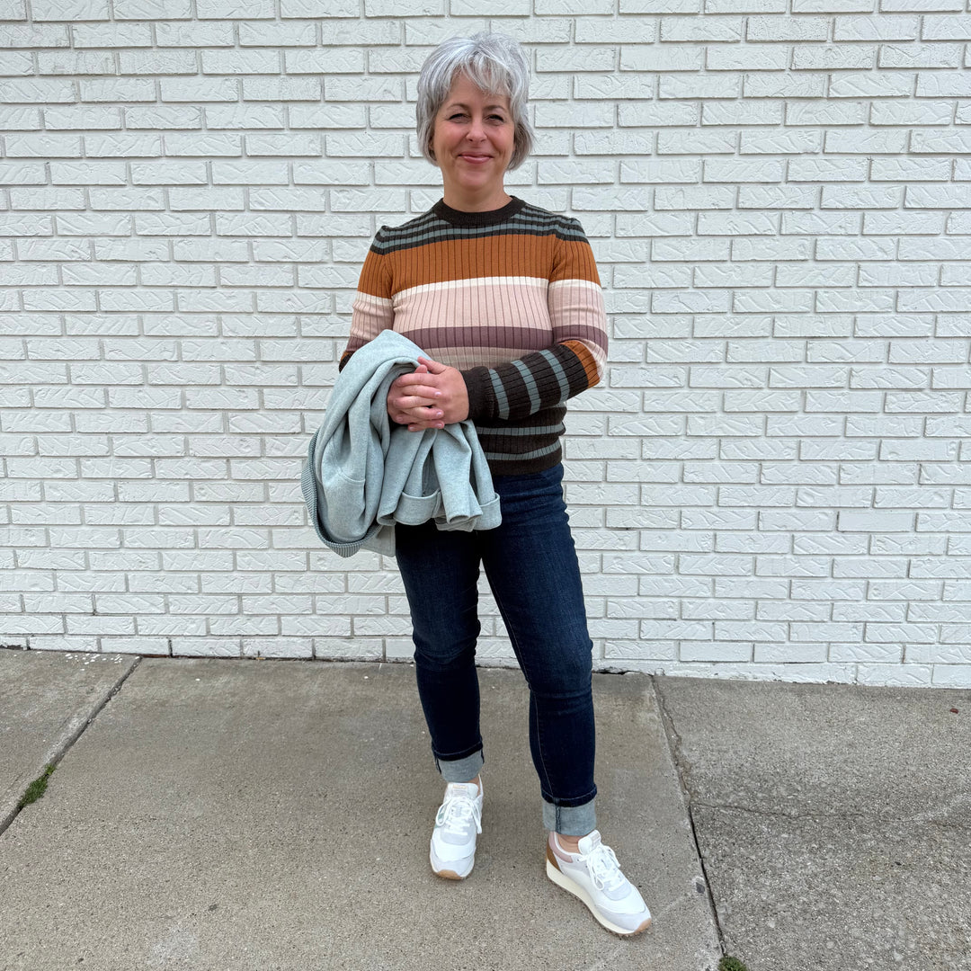 Fitted women’s ribbed knit top with long sleeves and a crew neck – model Becky wears a medium, fits true to size.

