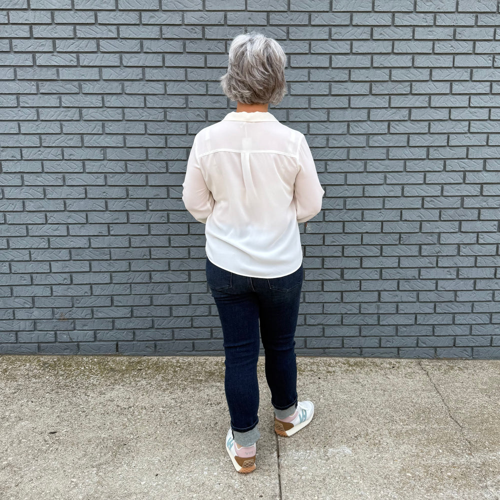 Women's loose-fit button-down top with long bubble sleeves – model Becky wears a small, fits slightly oversized.

