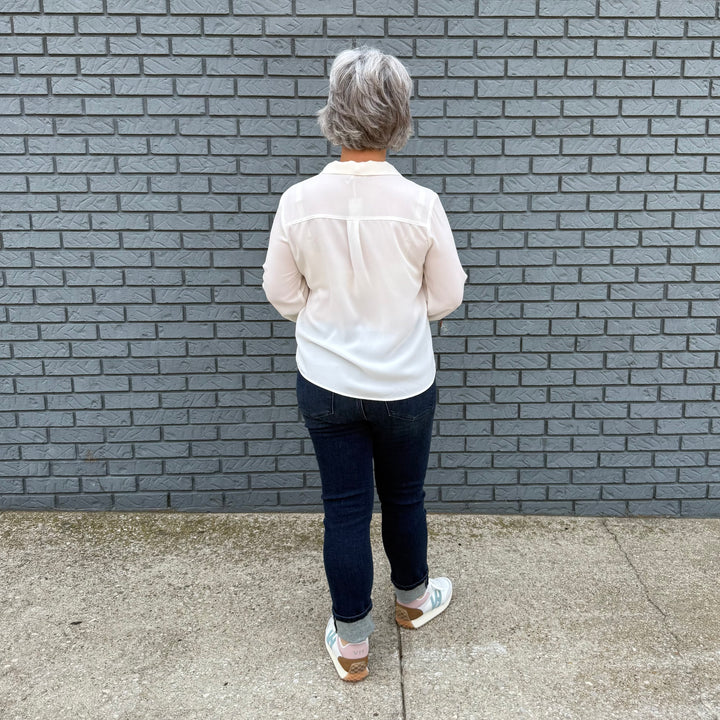 Women's loose-fit button-down top with long bubble sleeves – model Becky wears a small, fits slightly oversized.

