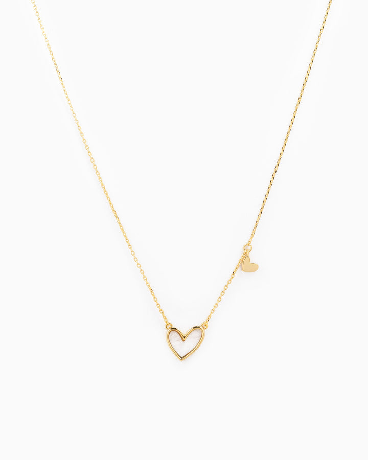 Sessori gold asymmetrical necklace with open heart pendant and small solid heart charm
