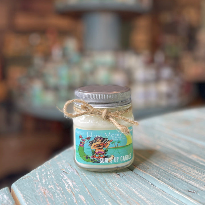 Surfs Up Candle Island Moon 8oz mason jar candle with twine bow and tropical mermaid label