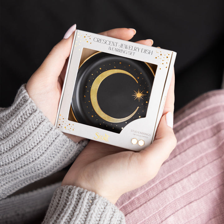 Scout Crescent Black jewelry dish and stud earring set held in hands in gift packaging
