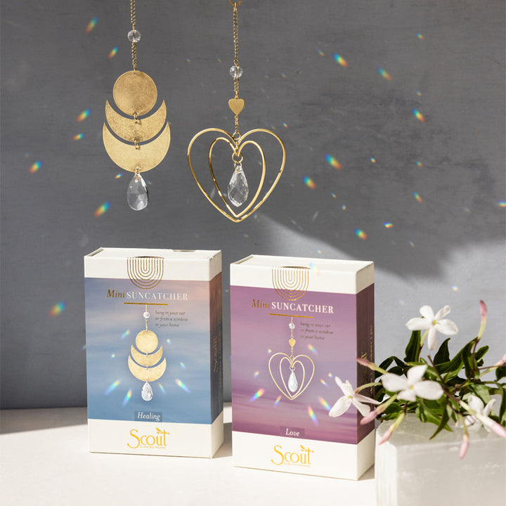 Scout Mini Suncatcher collection showing Love heart design and Healing moon phases with packaging