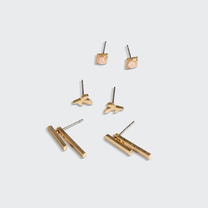 Gold stud earring trio set with rose quartz stones and geometric designs