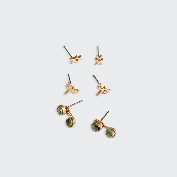 Scout gold stud trio jacket earring set with green olive stones on white background