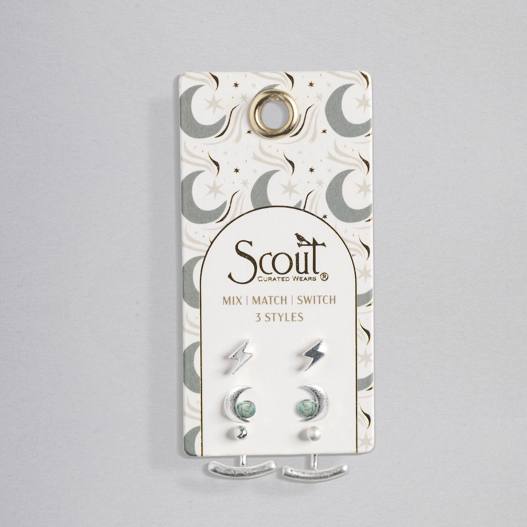 Scout Stud Trio Jacket Set with lightning bolts, turquoise stones, and silver crescents on celestial packaging