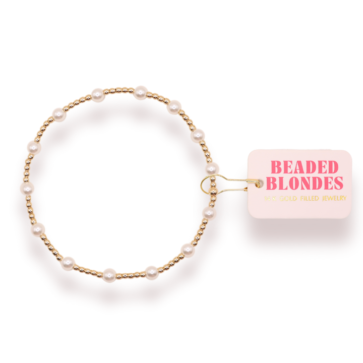 Beaded Blondes June Pearl Bracelet featuring gold beads and white pearl accents on display card