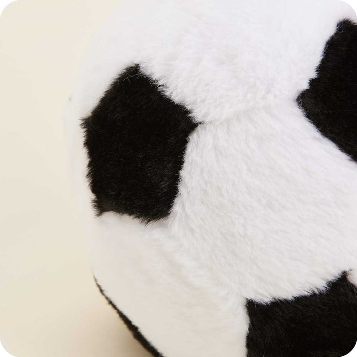 Warmies plush toy in black and white soccer ball pattern design