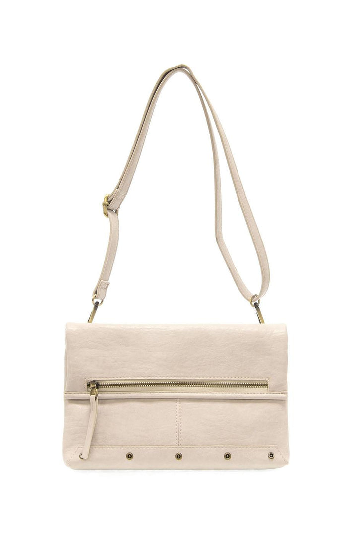 Cream colored convertible crossbody bag with adjustable strap and front zipper pocket