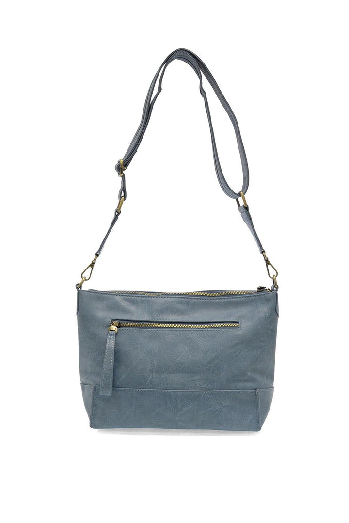 Joy Accessories Leen Seamed Crossbody bag in chambray blue with adjustable strap and gold hardware